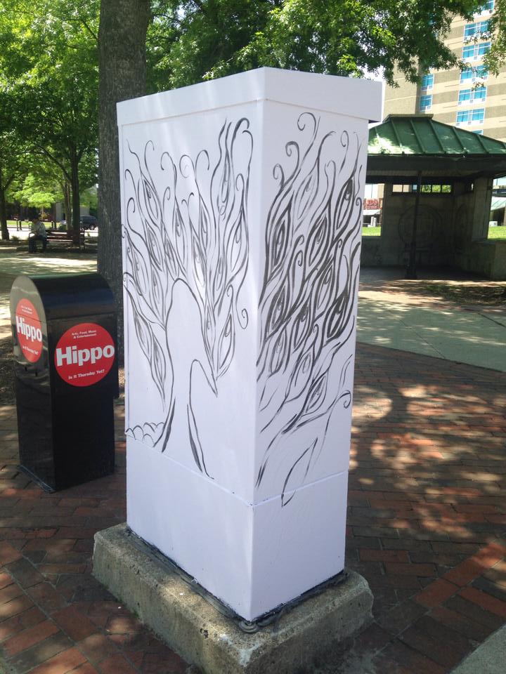 A peacock in progress on Main Street.