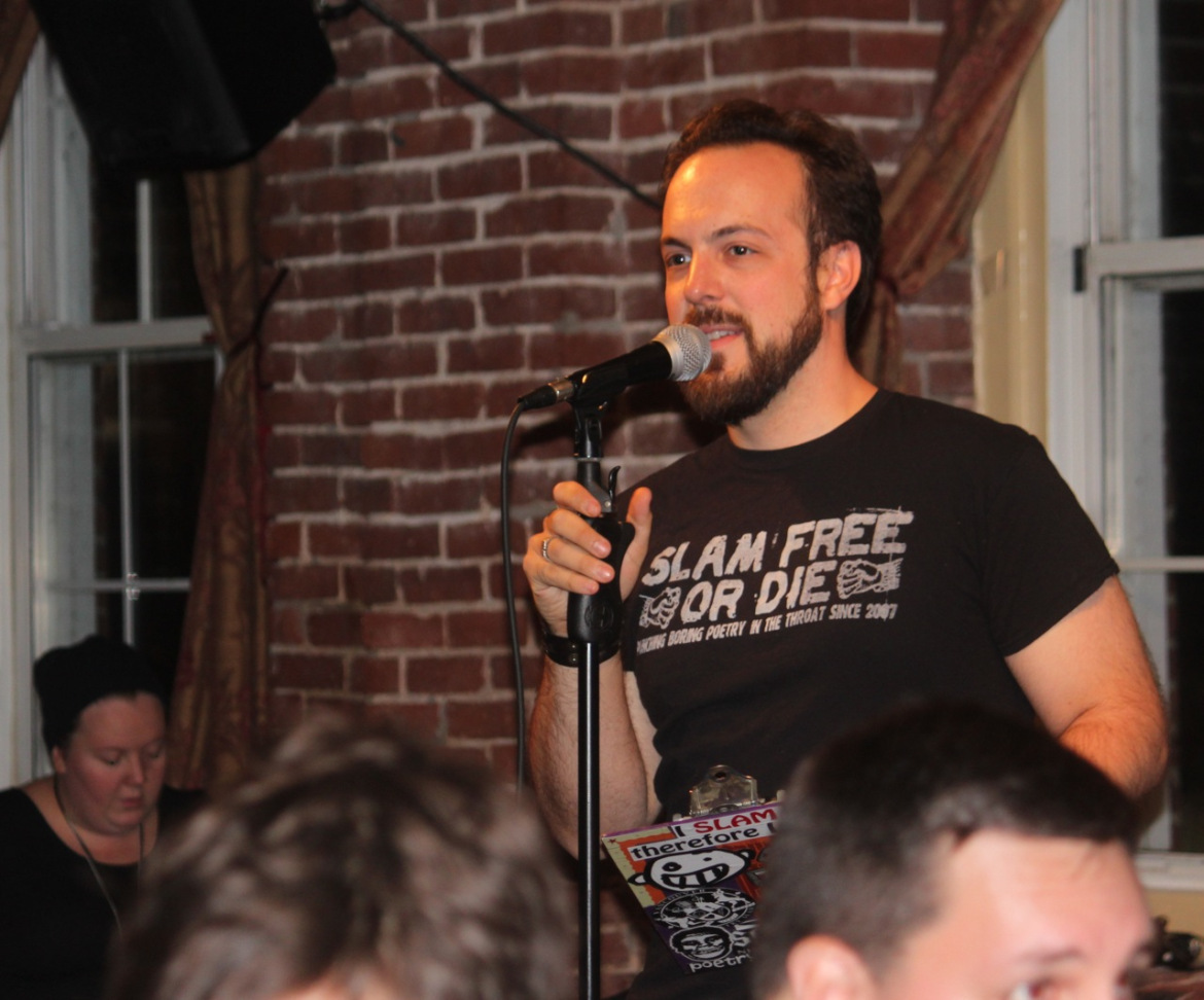 Mark Palos, aka The Colonel, was MC for the first half of Friday night's slam.