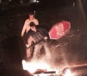 This photo has been identified as a West Virginia University riot photo, according to the Boston Globe.