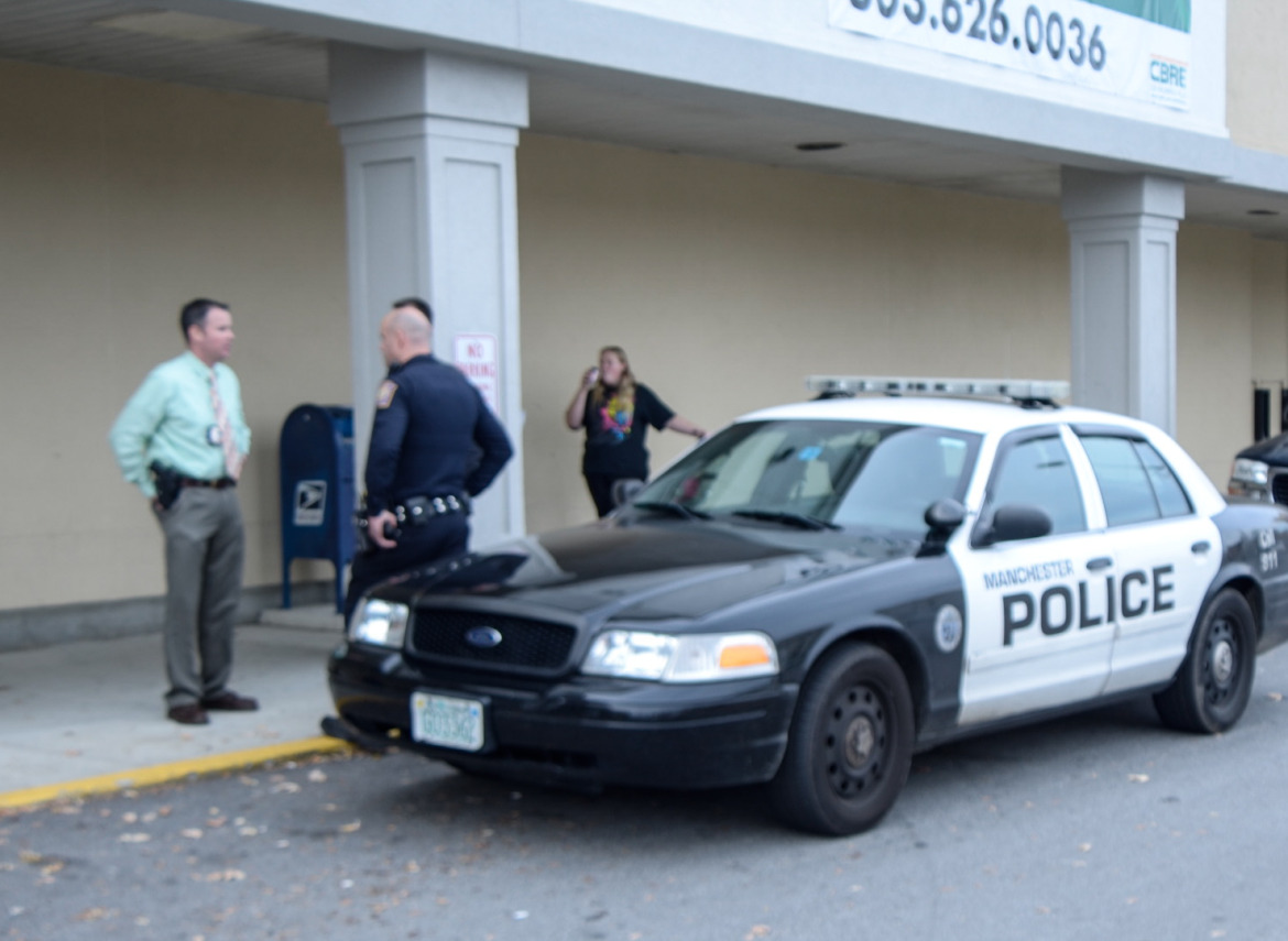 Police respond to robbery at Rite Aid on McGregor Street.