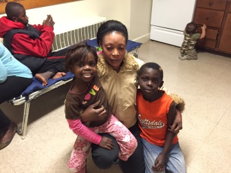 Nadia Osman with two of her five children, Martha, 4, and Batalu, 7.