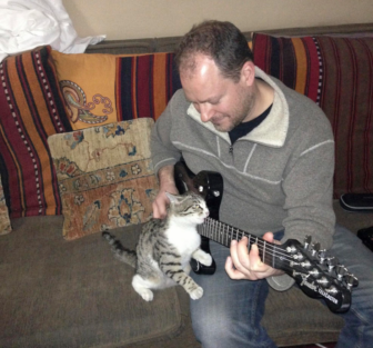 NPR correspondent Sean Carberry and Squeak, rocking out.