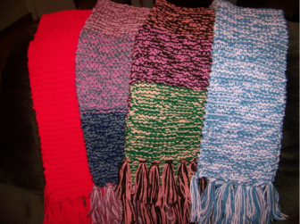 Scarves knitted by Louise LaFerriere for the Scarves in the Park initiative.