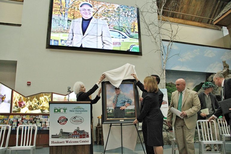 Gov. Maggie Hassan and  Joan Day, Ray Burton's sister, unveil Burton's portrait at the welcome center dedication ceremony on March 17.