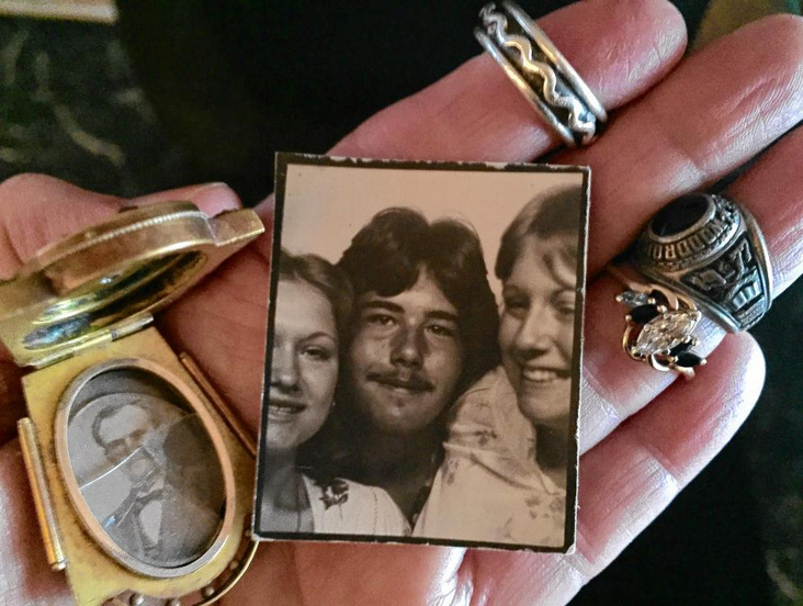 Clockwise from top: The silver band, the high school ring, the wedding ring, the BFF selfie, the locket.