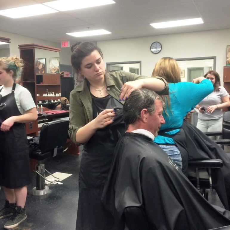 Students provided makeovers for a group of veterans from the Liberty House.