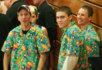 Outstanding YMCA wrestling coach Rick Ross, left, standing out in a crowd.
