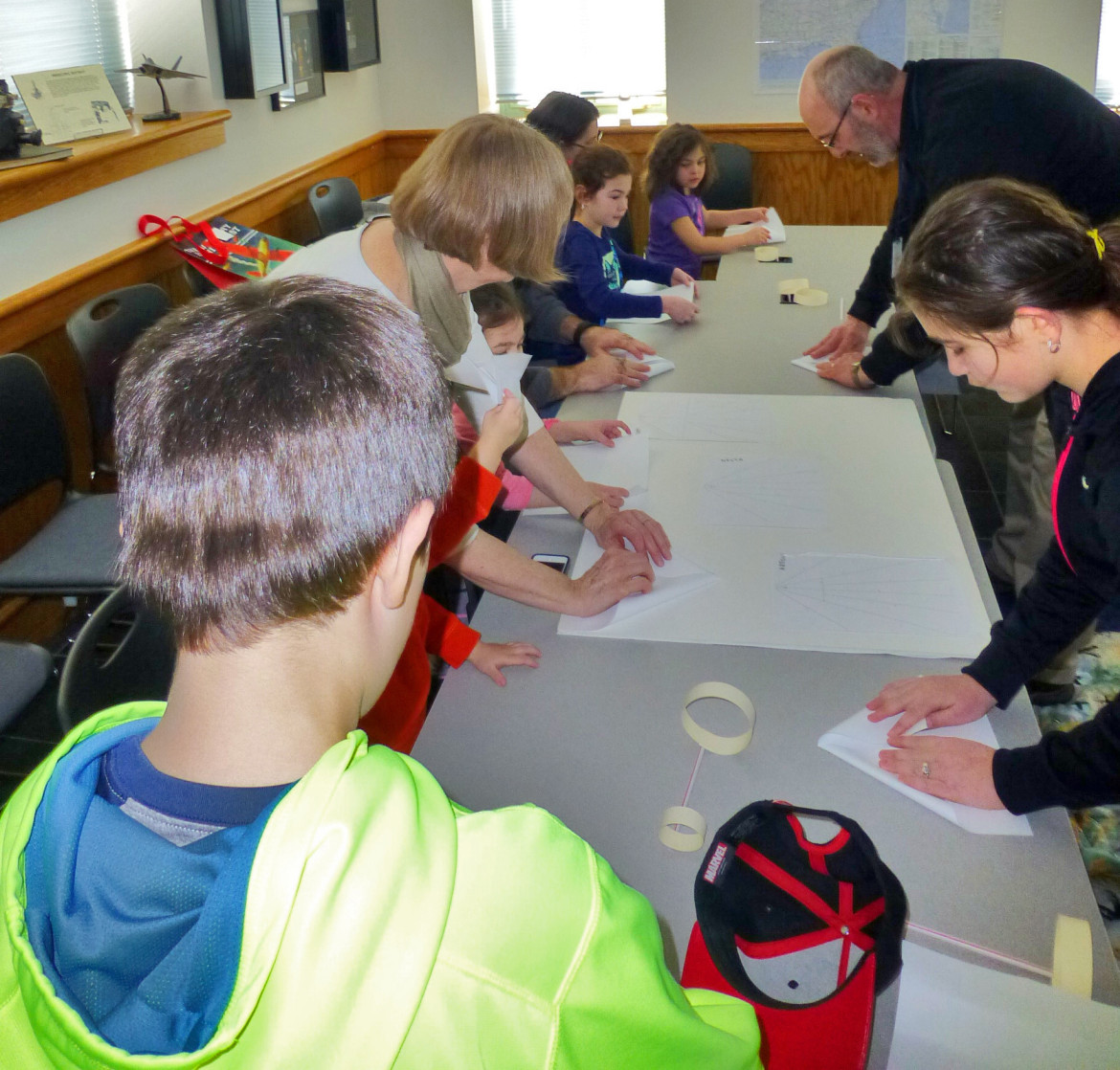 Kids enjoy the challenge of paper airplanes.