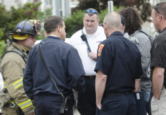 Police, Fire and DEA officials at a Lake Avenue address for a drug investigation May 18.