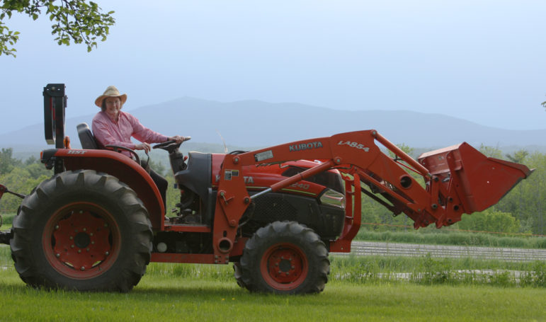 Organic gardener Rosaly Bass doing what she does.