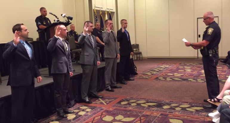 New officers sworn in by Chief Willard, his first official act as Chief.