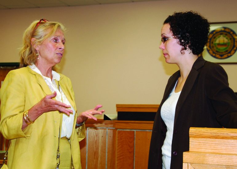 Diane Levesque, left, director of the Veterans Justice Outreach program at the VA in Manchester, speaks with Allenstown police prosecutor Alicia Piazza before a court hearing in Hooksett.
