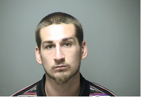 Reynolds, charged with possession of a controlled drug (heroin).