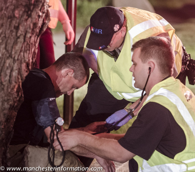 A firefighter is treated at the scene by AMR, but suffered no serious injuries.