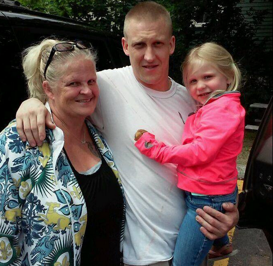 Heidi Sanderson with her son and granddaughter, a stop on the way to Farnum Center where her son is entering treatment for addiction.