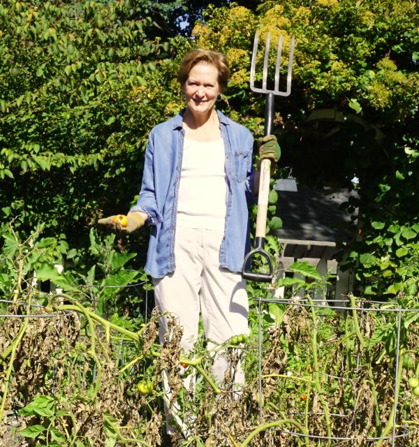 Carolyn Choate with the last of her Early Girl tomatoes.
