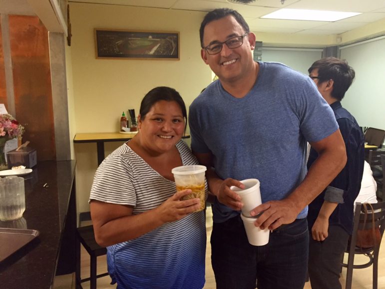 Sue Lee and her hubby taking home the leftover spicy beef soup.