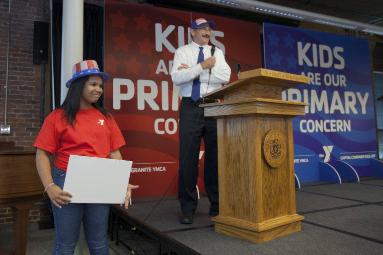 Hal Jordan, YMCA president, and Stay student Tyana Cruz.