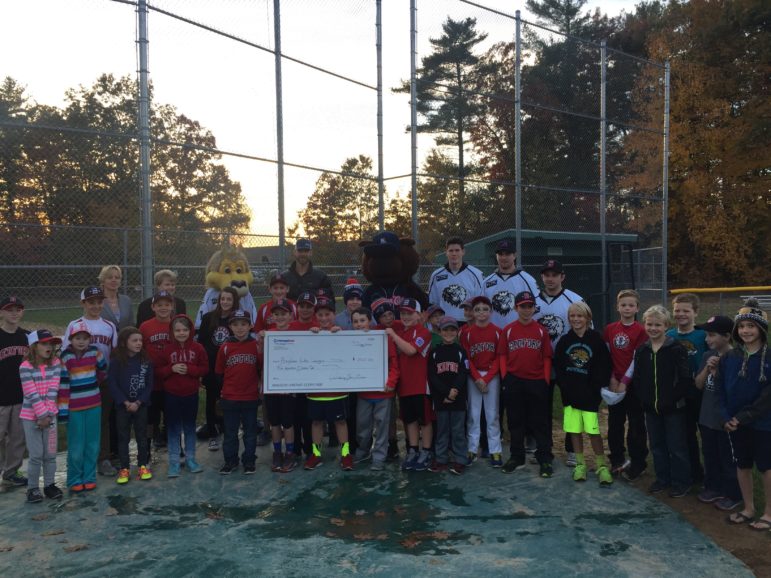 A giant $500 check was delivered to Bedford Little League by some special friends.