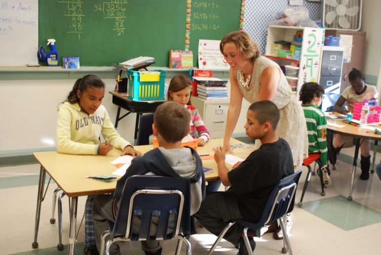 Lucy at work with her students.
