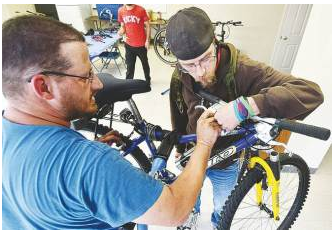 Queen City Bike Collective repairs and recycles bicycles, and holds weekly workshops to assist bike owners in repair and maintenance.