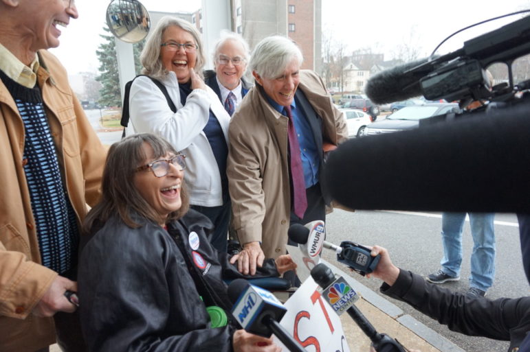 Linda Horan is pictured with her attorney Paul Twomey and friends outside Merrimack County Superior Court in Concord.