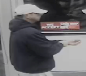Surveillance photo of robber.