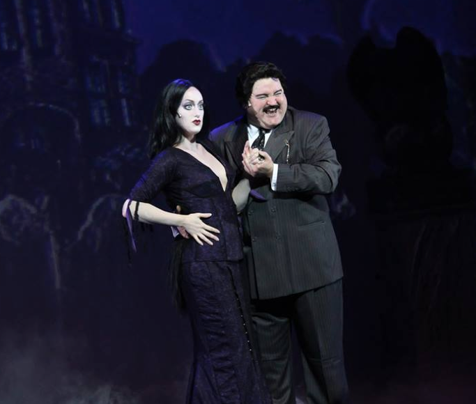 Chloe Fox as Morticia and William Hartery as Gomez, the heart of the Addams Family.