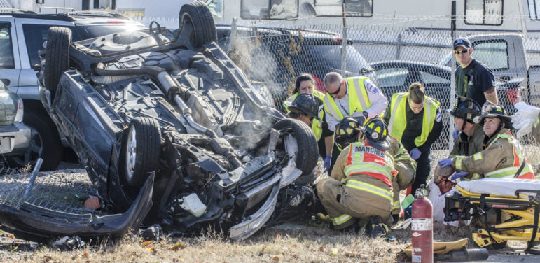 Rescuers at the scene of crash on Beech Street.