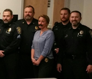 Chief Willard (Center), who is presenting a check to Joy Barrett (holding the check) of Granite State Children’s Alliance, surrounded by a handful of the 125 officers who participated in the Beards for Bucks fundraiser, as well as several GSCA board members. Detective Lieutenant Ledoux is pictured in the faux mustache.