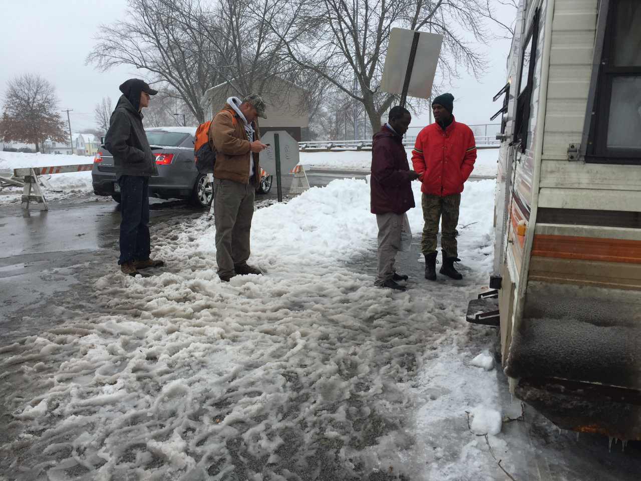 People waiting in line to pay the $110 to get their cars out of the impound lot in Dec. of 2015, the first big tow of the season.