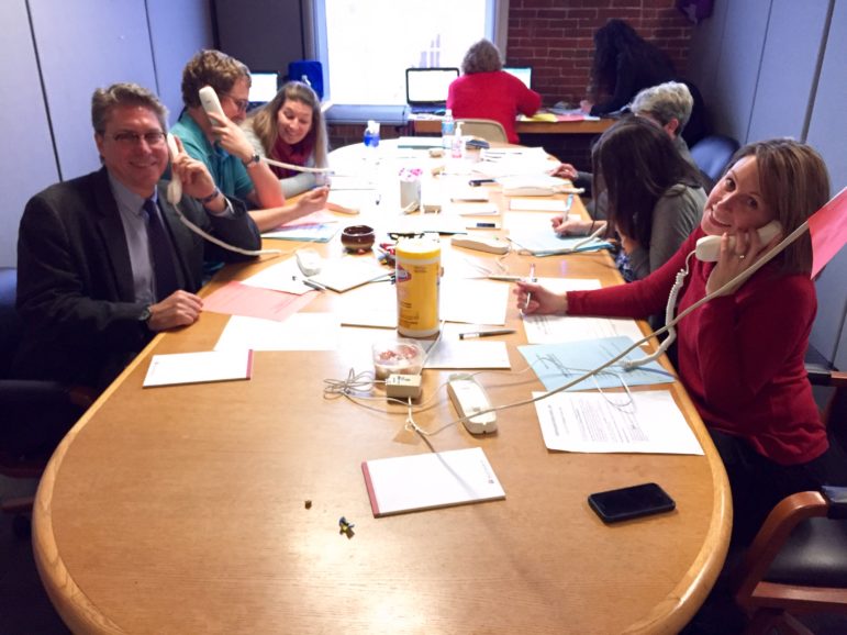 Employees of Child & Family Services man the phones on Day 2 of the WZID radiothon, including CEO Borja Alvarez deToledo, left.