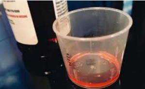 Recall due to improper markings on dosage cups in children's cough syrups.