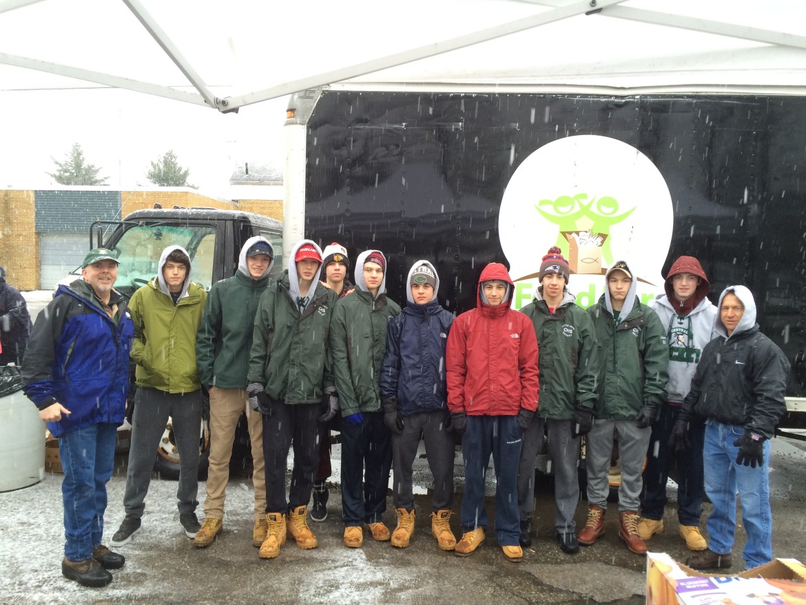 L to R Pete Dalrymple President Food for Children, players Cam Warner, Mathieu Cislak, Stephen Langley, Casey Hoag, Captain Nathan Potvin, Bowen Bilodeau, Logan Pacheco, Zach McKenna, Curtis Chiesa, Jack Cavanaugh, Coach Brian Stone (Missing George Gatzoulis). 