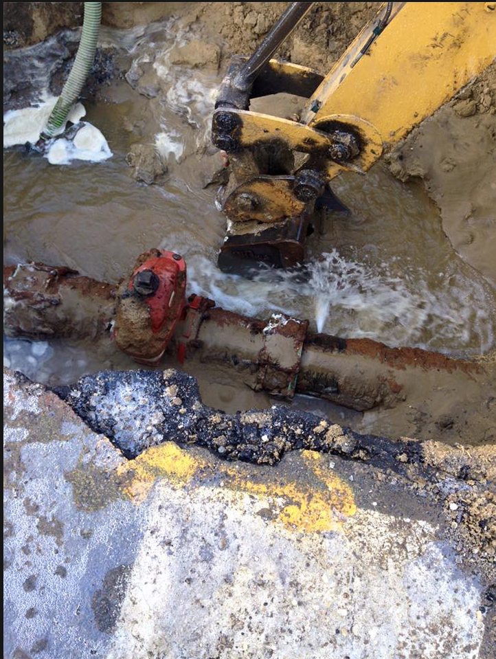 Broken pipe outside Central High School.