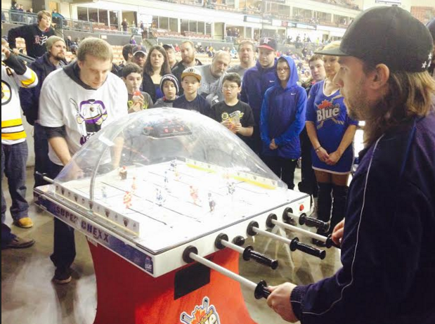 Like a mini-ice hockey universe inside a bubble.