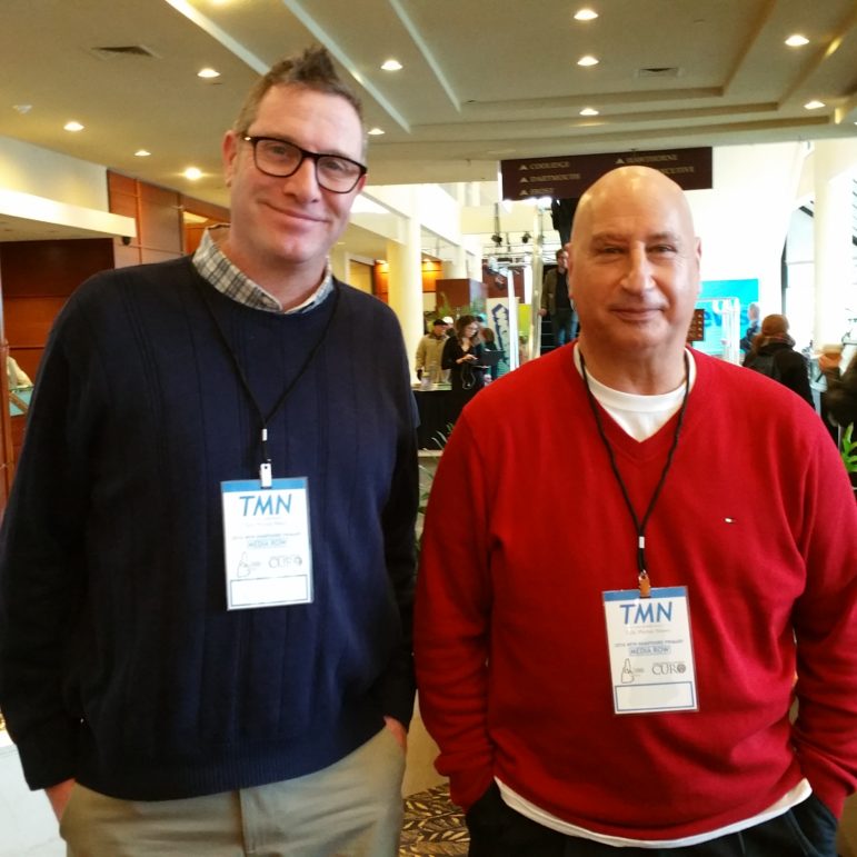 Peter White, left, and Joel Elber, right, on Radio Row during the NH Primary.