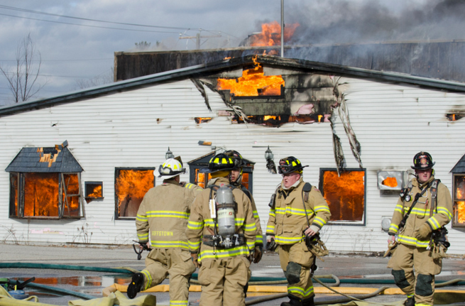 Firefighters at the scene of a 3-alarm fire on Feb. 21, 2016 in Goffstown.