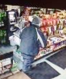 Surveillance photo of robber leaving Budget Gas on Jan. 30.