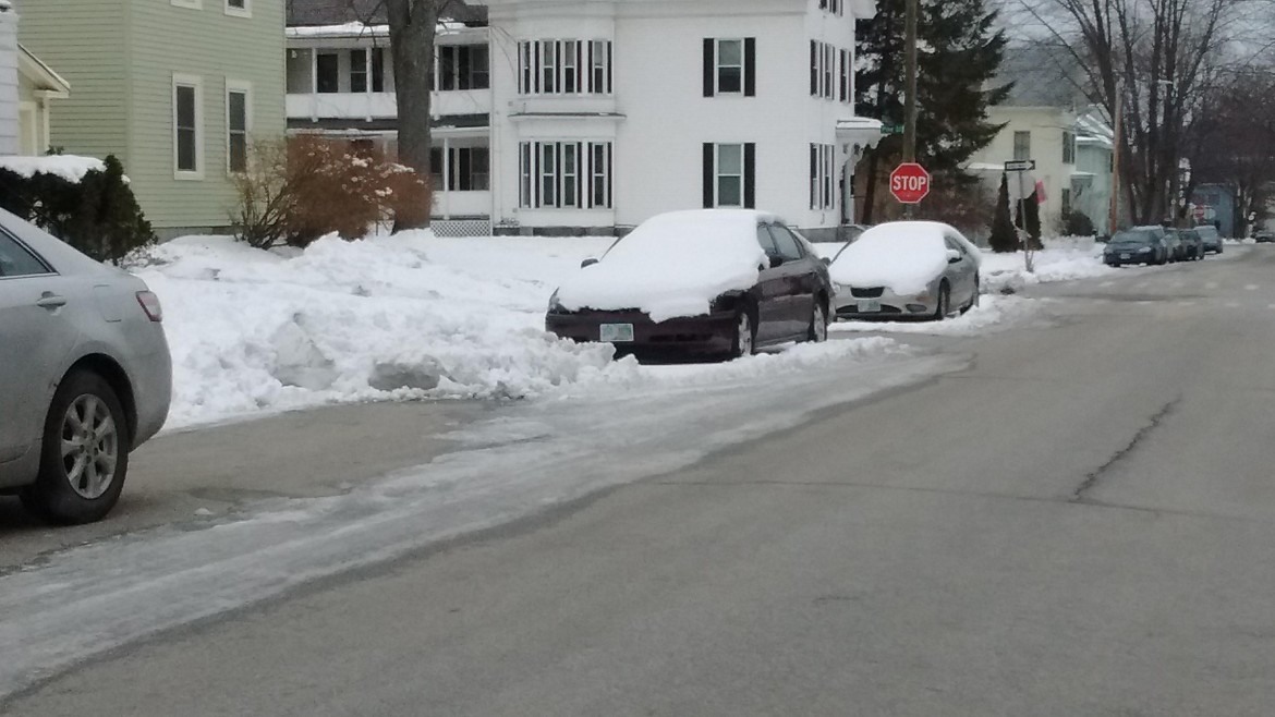 Cars at the intersection of Pine and Blodgett, obviously not towed during last weekend's citywide snow emergency.