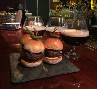 Three mini burgers on Brioche buns paired with three beers and herb parmesan fries- served daily during Burgerfest at BVI