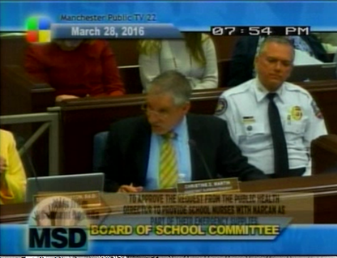 City Health Dept. Director Tim Soucy, left, and AMR General Manager Chris Stawasz field questions from the school board Monday night.