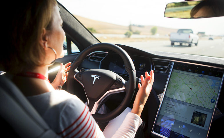 New Autopilot features are demonstrated in a Tesla Model S during a Tesla event in Palo Alto, California October 14, 2015. REUTERS/Beck Diefenbach 