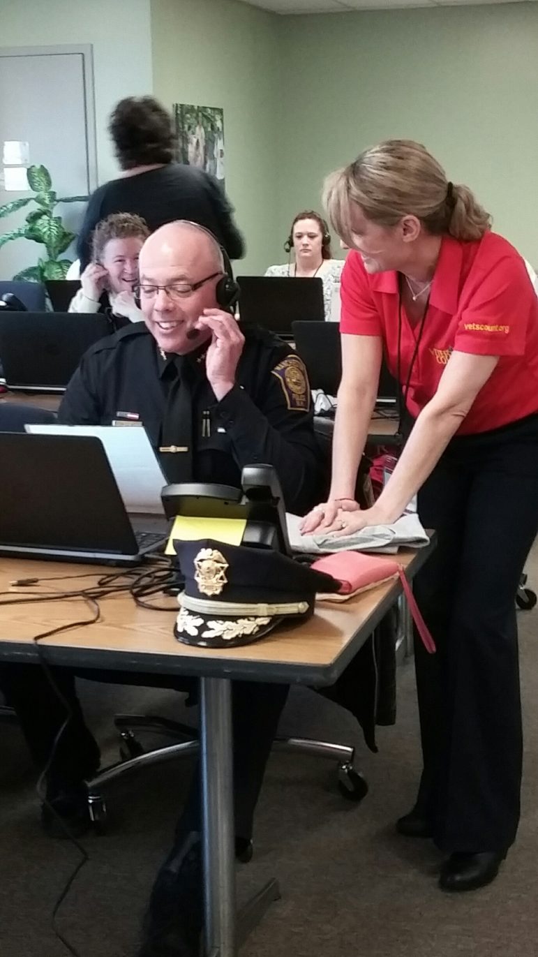Manchester Police Chief Nick Willard manning the phones during the March 23 radiothon.