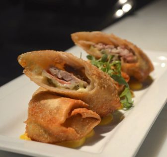 Cuban egg roll with a yellow mustard sauce at Gale Motor Co. Eatery