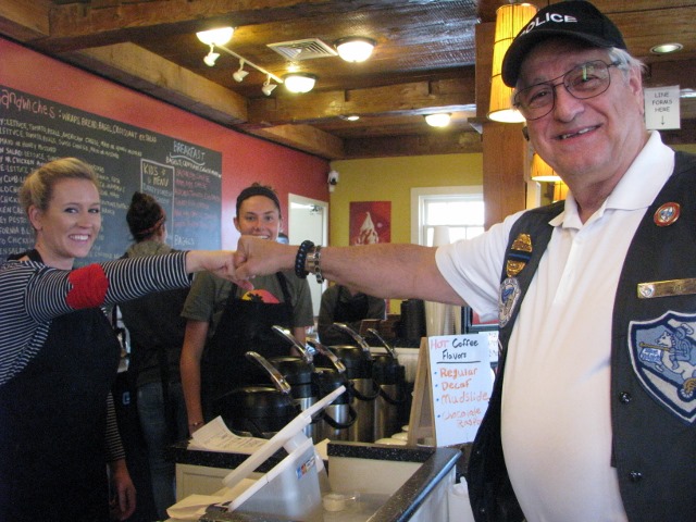 Inside Scoop owner Hillary Rankins, left, with Breathe NH volunteer Joe Teta of Haverhill, Mass.