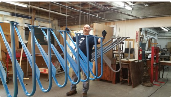 James Beer was a key player on his sister's team, seen here doing something amazing that looks a lot like levitating 17 bike racks.