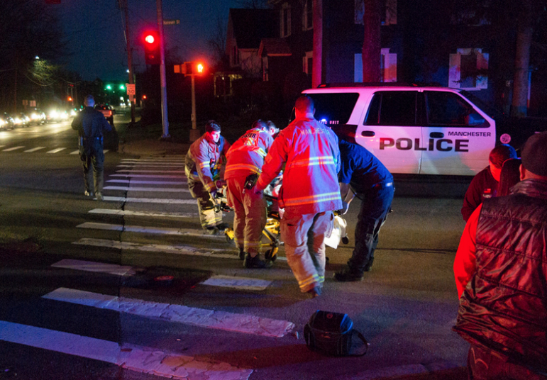 First-responders at the scene of an accident where a pedestrian was struck Thursday night on Hanover Street.