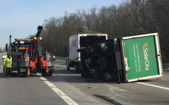 Rollover at Exit 13 on I-93 April 6 involving a Solar City box truck.