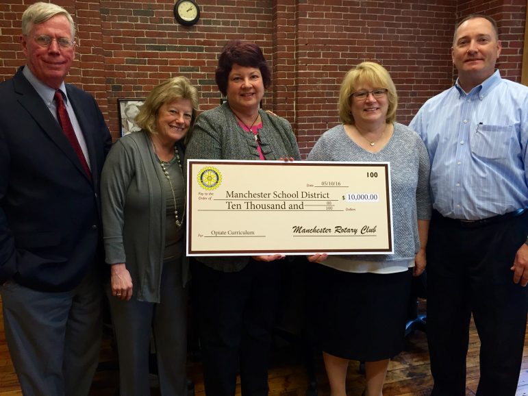 Manchester Rotary Club president Mark Burns, Rotary Foundation chair Sue Manchester, Rotary program chair Cindy Gaffney, Manchester School District superintendent Debra Livingston, assistant superintendent David Ryan.